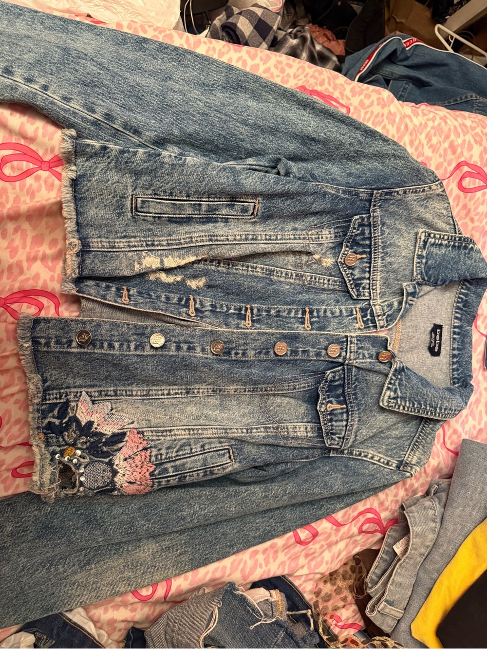bebe Blue Distressed Denim Jacket with Embroidered Floral Accent - Picture 2 of 6
